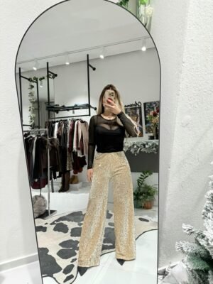 “Glow velvet” trousers